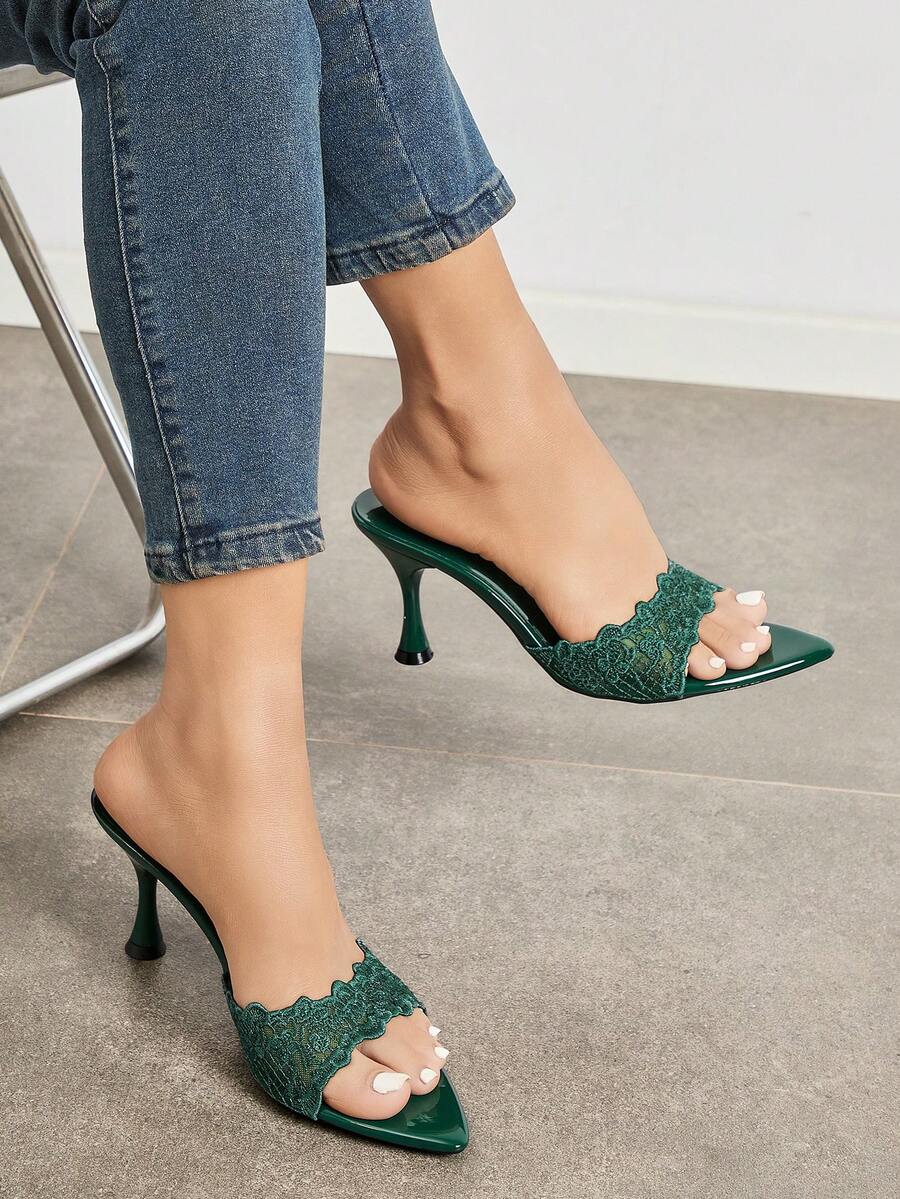 Women's pointed toe high heel mule sandals featuring a sleek slip-on design with elegant lace embroidery detailing