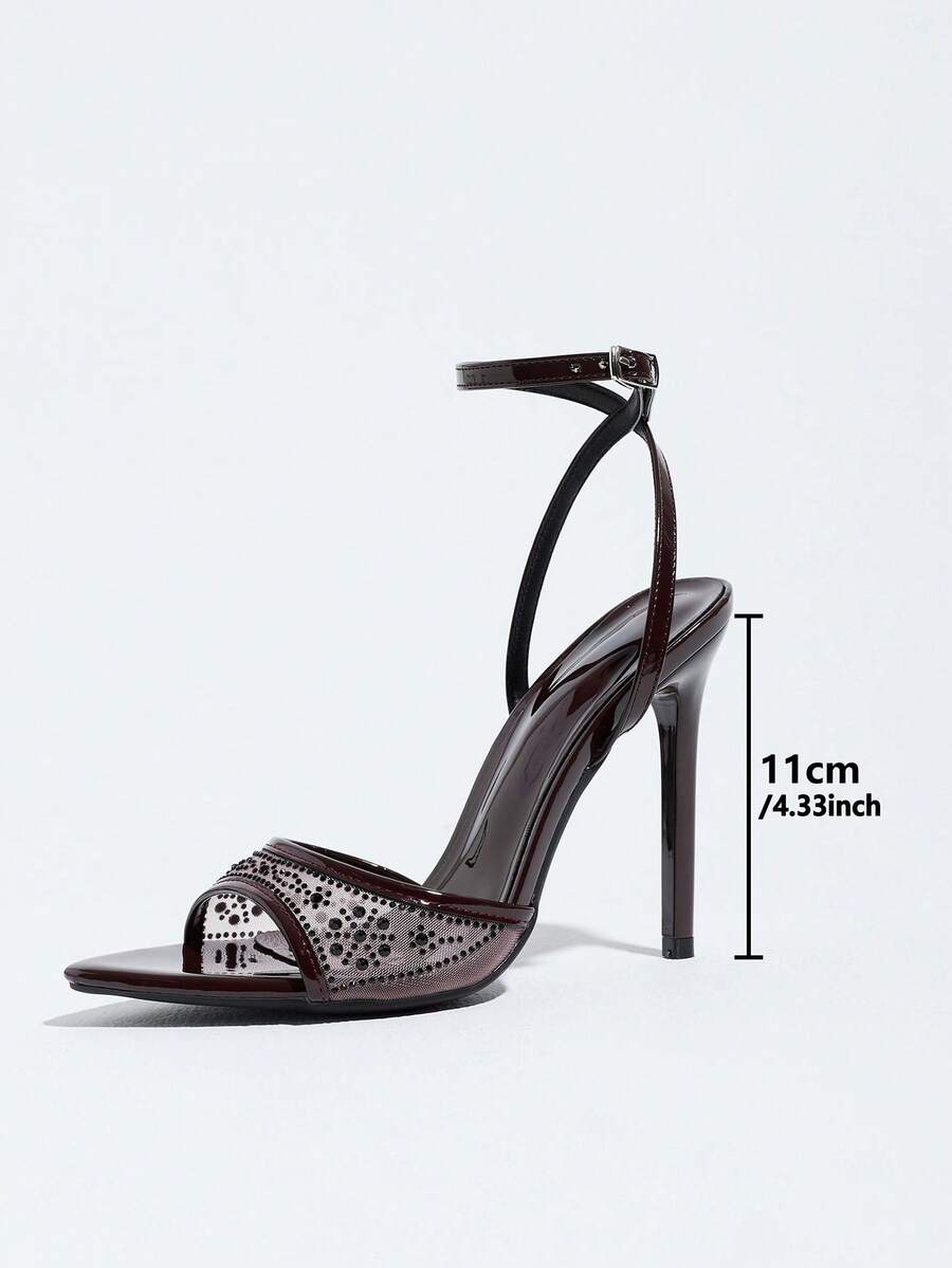 Burgundy women's high heel sandals featuring lace mesh accents, stiletto heel, open round toe, and buckle ankle strap.