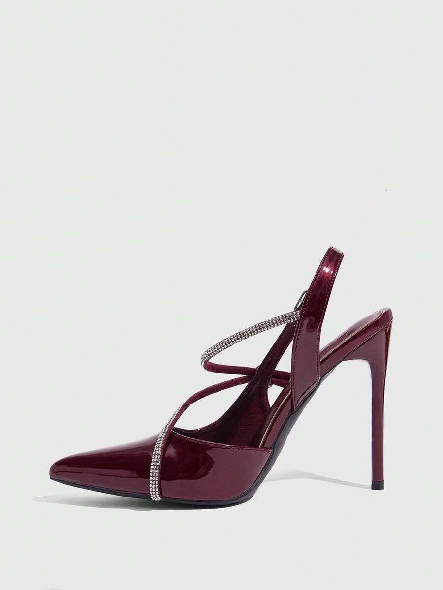 Pointed toe stiletto high heels with slingback silhouette and adjustable buckle ankle strap.