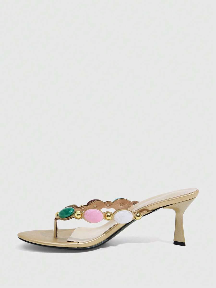 Elegant ladies strappy high-heeled slippers featuring a sleek toe post, buckle accent, and stiletto mid heel in smooth PU leather.