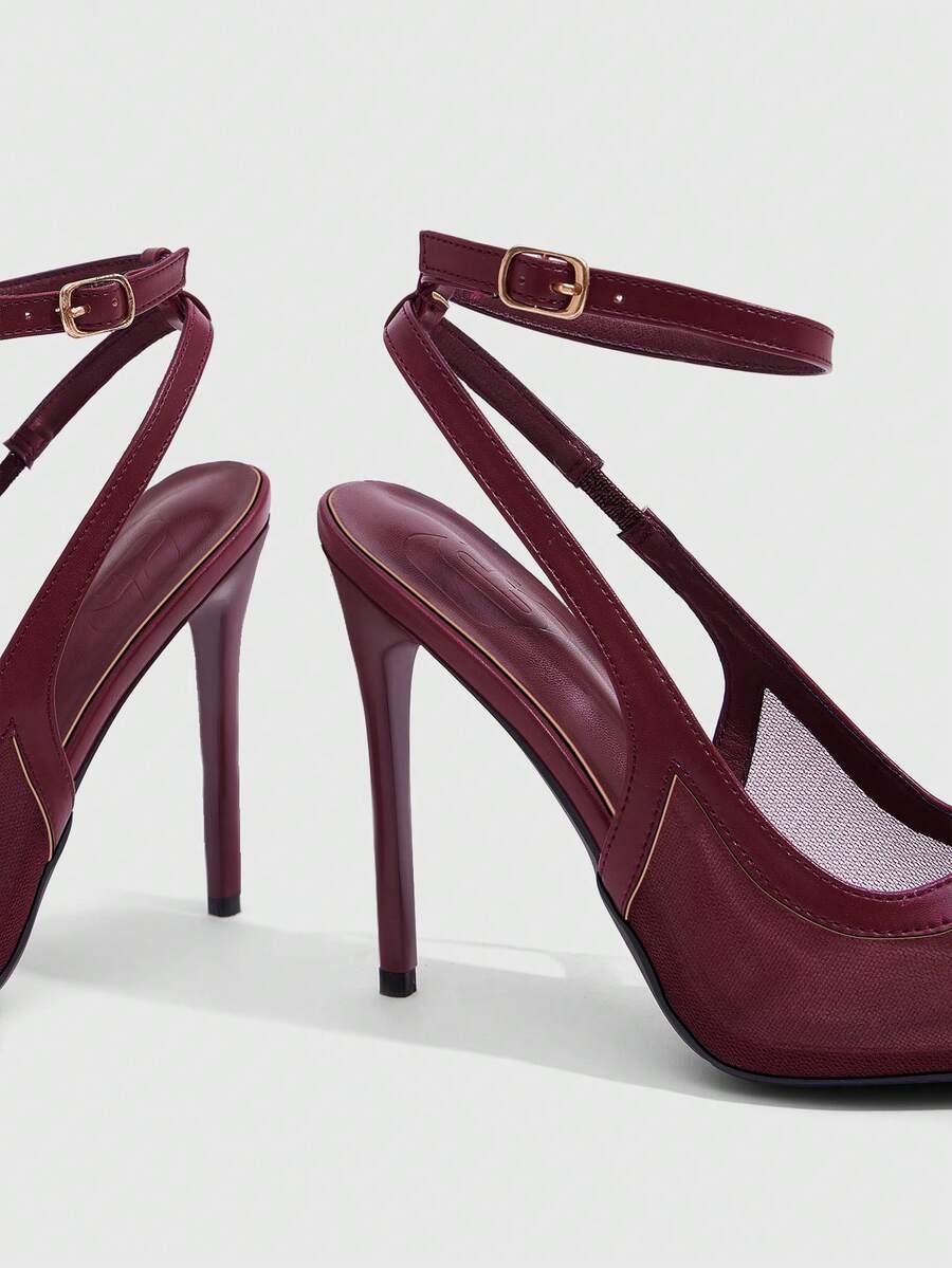 Women's pointed toe high heel shoes featuring breathable mesh detailing, stiletto heel, and adjustable ankle strap with buckle closure.