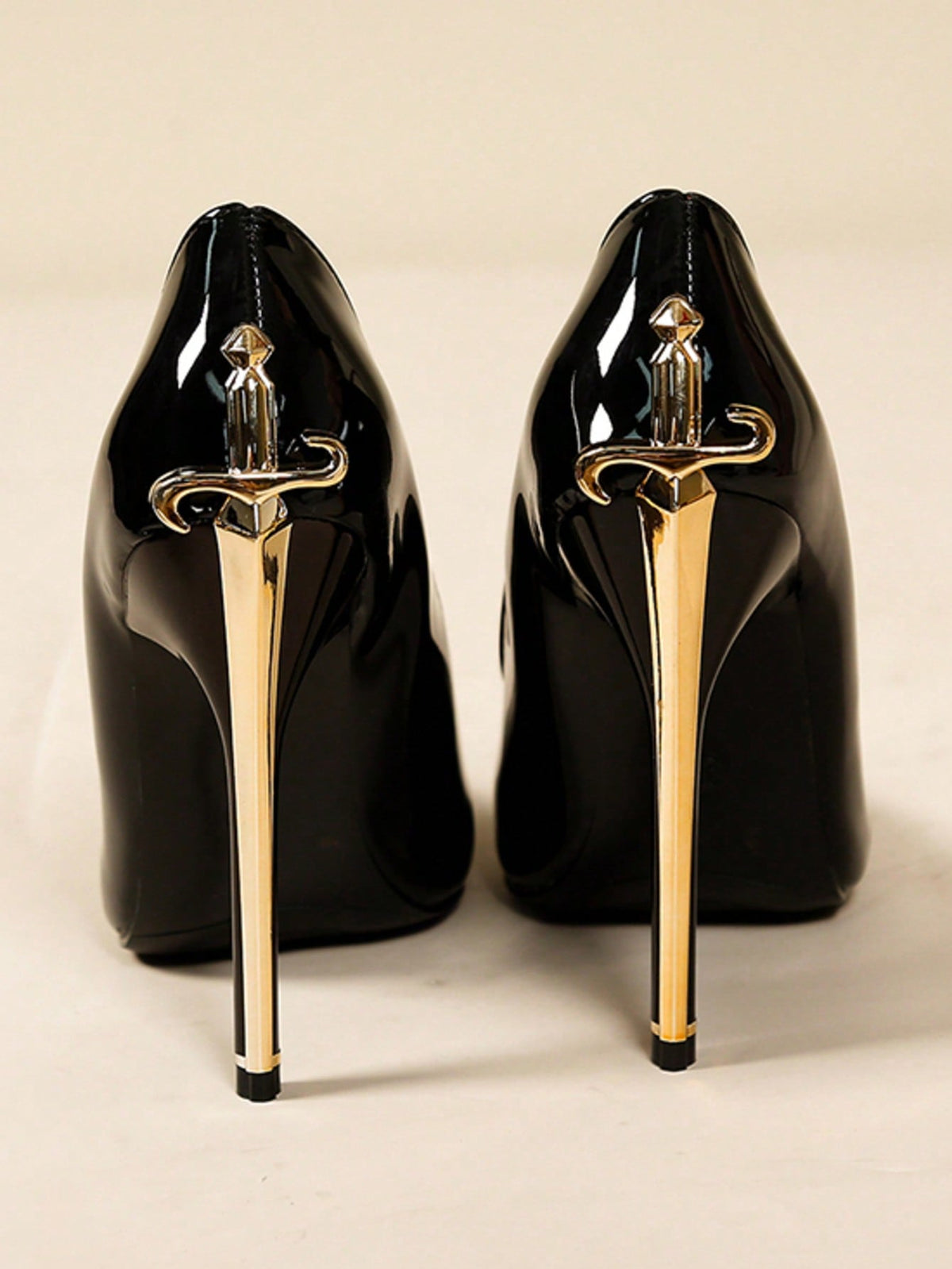 Glossy black pointed toe stiletto high heel pumps with bow detail for women