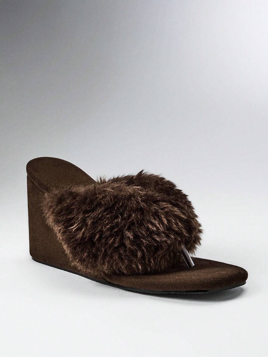 Women's slip-on thong strap wedge sandals featuring a high wedge heel and smooth PU leather upper.
